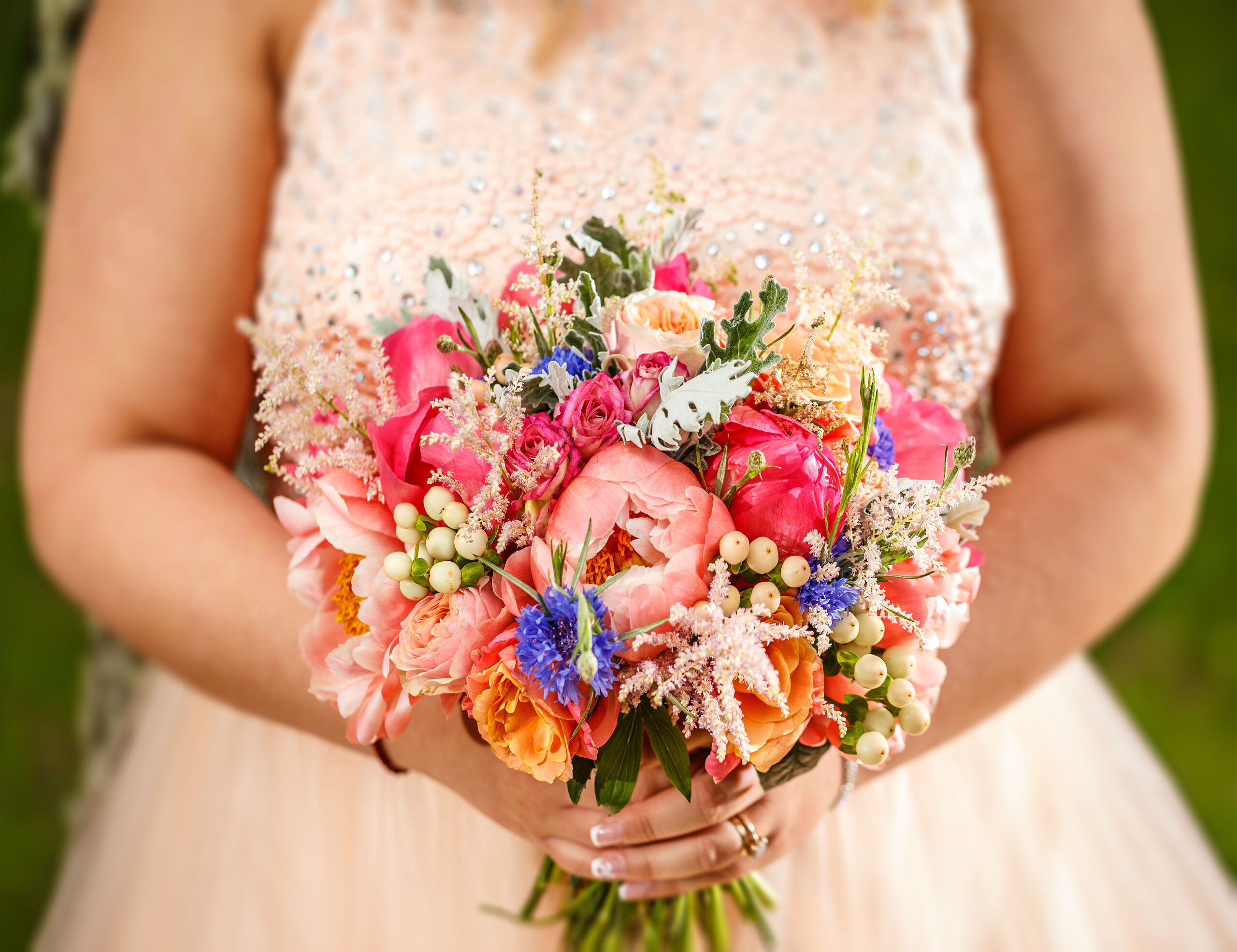 Beauty wedding bouquet in bride's hands